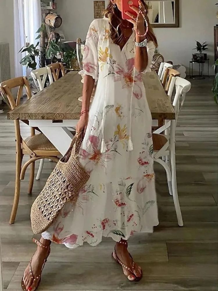 Elaris – Blommig maxiklänning med romantisk charm