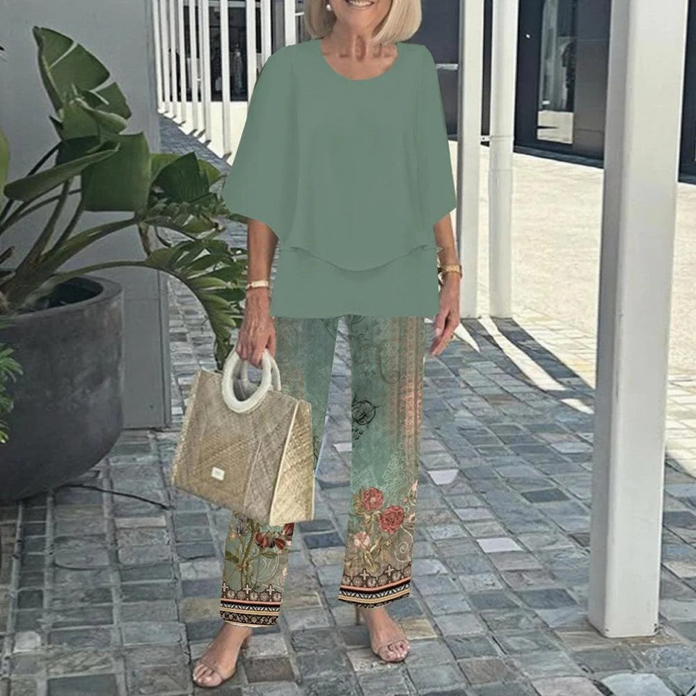 Ingrid – Elegant set med blus och mönstrade byxor