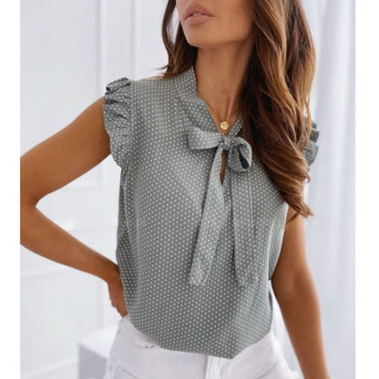 Emina – Mouwloze blouse met strikdetail