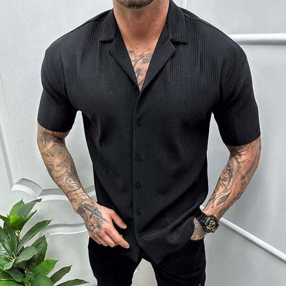 Luca - Black ribbed shirt with a powerful expression