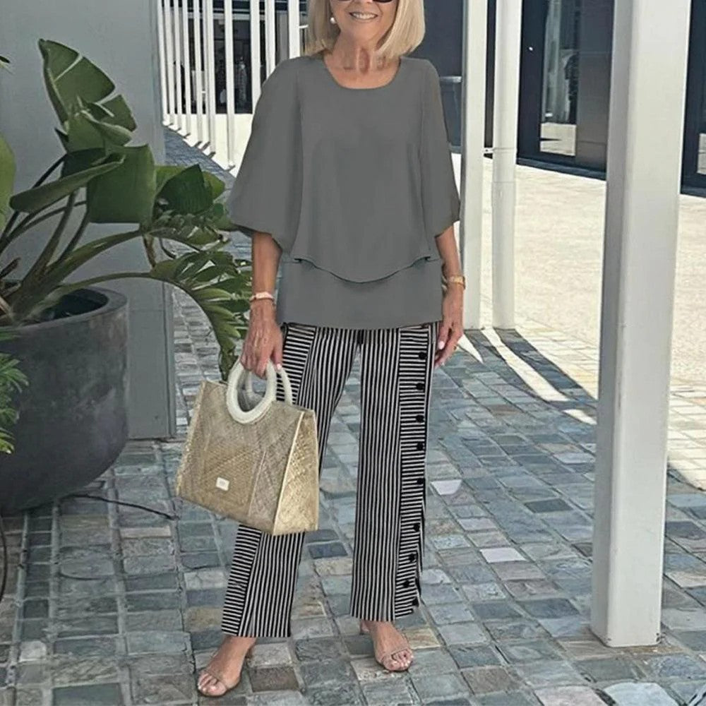Ingrid – Elegant set med blus och mönstrade byxor